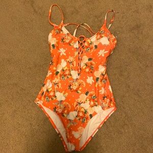 Coral, floral swimsuit by LAUNDRY by Shelli Segal